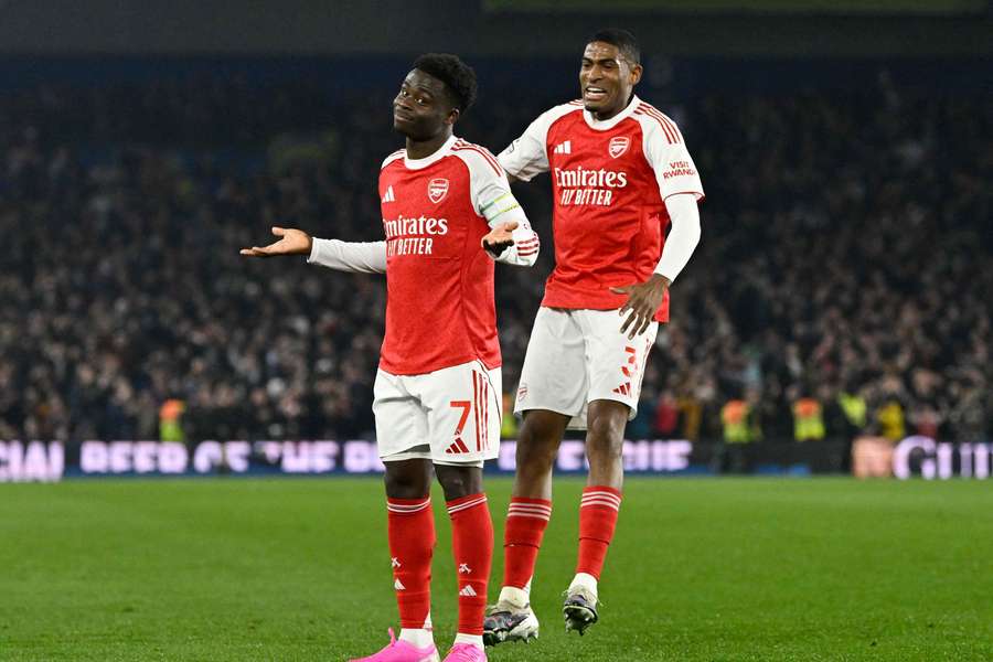 Arsenal's Bukayo Saka celebrates scoring their first goal with Cristhian Mosquera Arsenal's Bukayo Saka celebrates scoring their first goal with Cristhian Mosquera