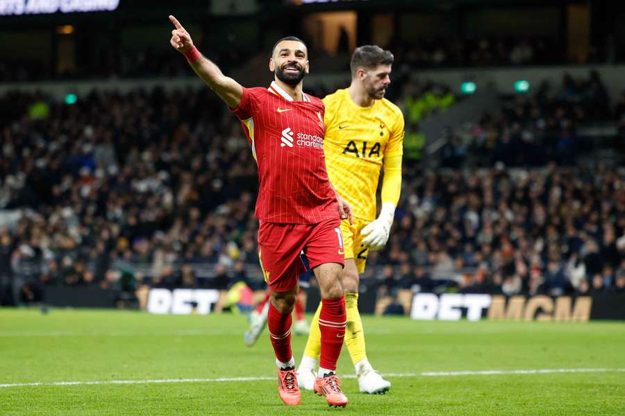 Liverpool's Mohamed Salah celebrates scoring their fifth goal against Tottenham on Sunday