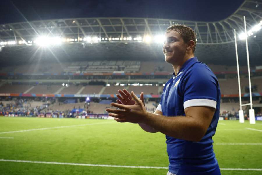 Italy's Michele Lamaro celebrates after the match