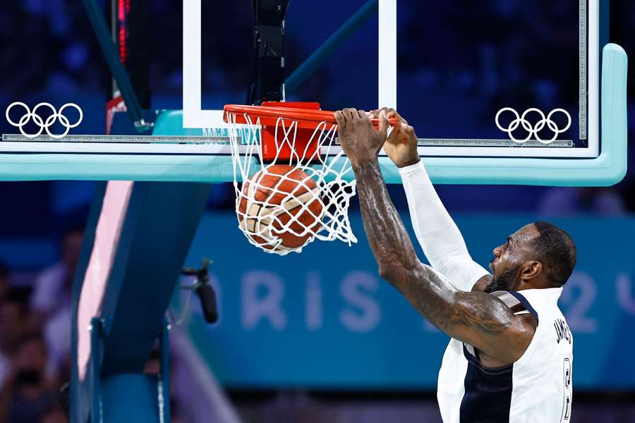 USA's #06 LeBron James dunks the ball 