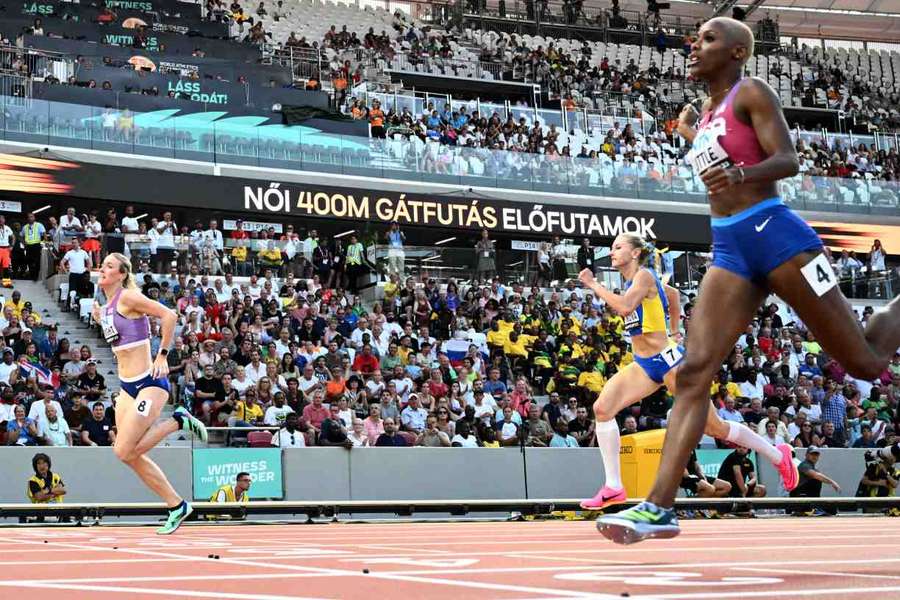 Britain's Jessie Knight crosses the line to qualify for the 400m hurdles semi-final