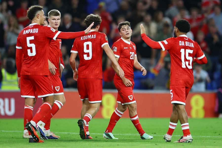 Wales' players celebrate against Norway