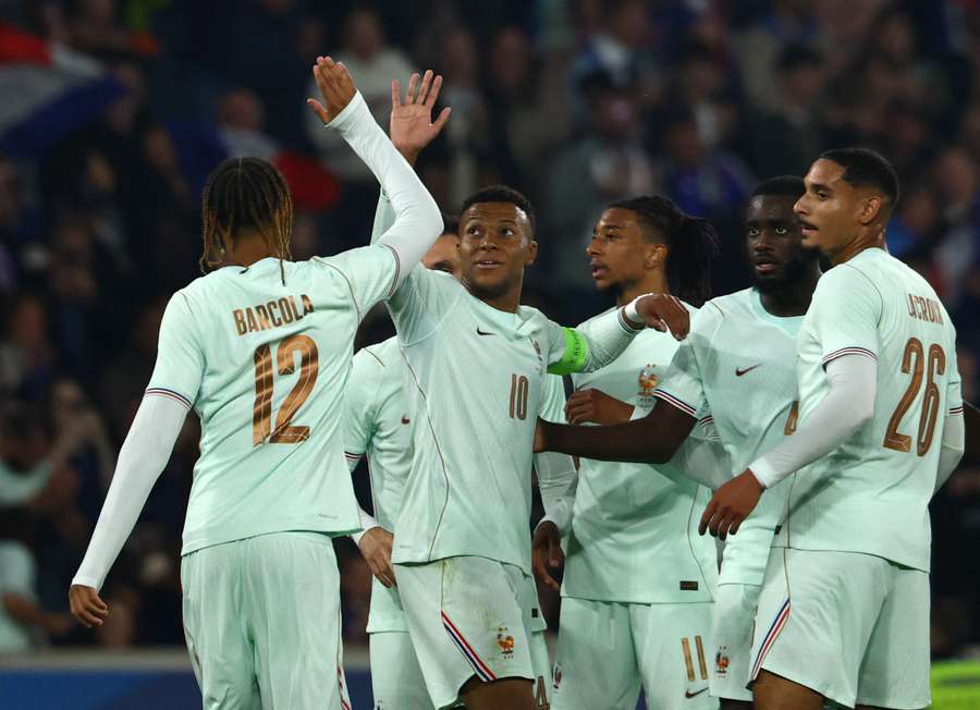 France's players celebrate a goal in their friendly against Northern Ireland. France's players celebrate a goal in their friendly against Northern Ireland.