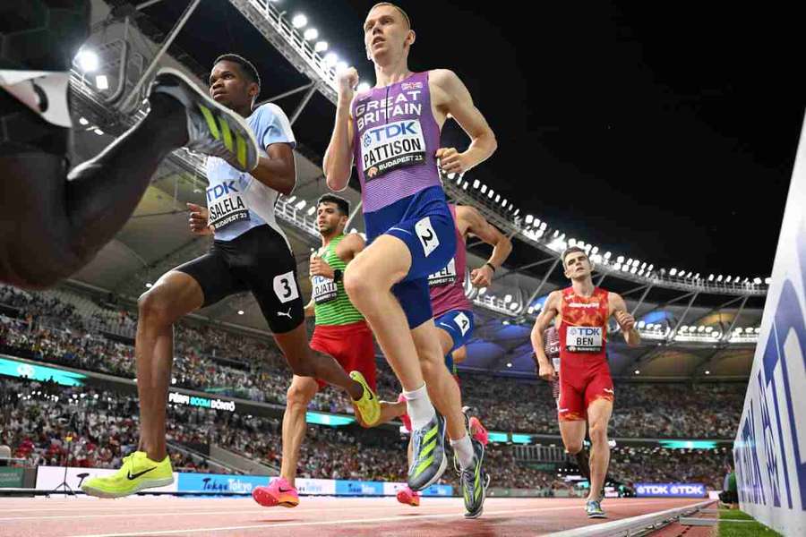 Ben Pattison runs alongside Botswana's Tshepiso Masalela during the men's 800m final Ben Pattison runs alongside Botswana's Tshepiso Masalela during the men's 800m final