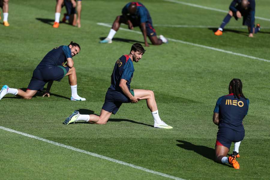 Portugal's midfielder Ruben Neves, Portugal's defender Ruben Dias and Portugal's midfielder Renato Sanches attend a training session at Cidade do Futebol in Oeiras