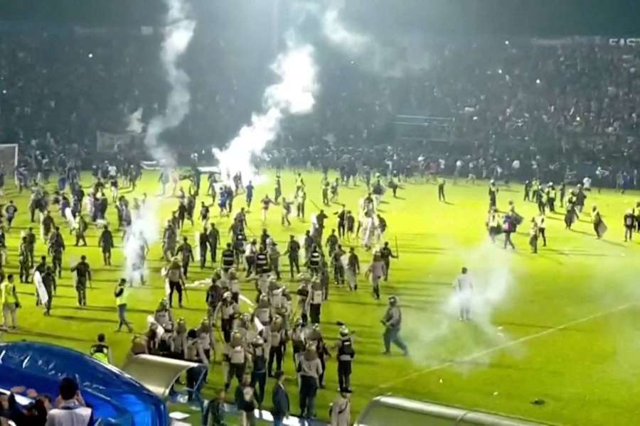 Indonesia football stampede kills over 125 after police use tear gas in stadium