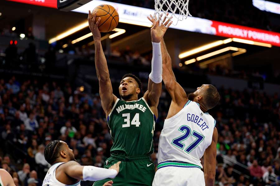Giannis Antetokounmpo (L) in action for the Bucks