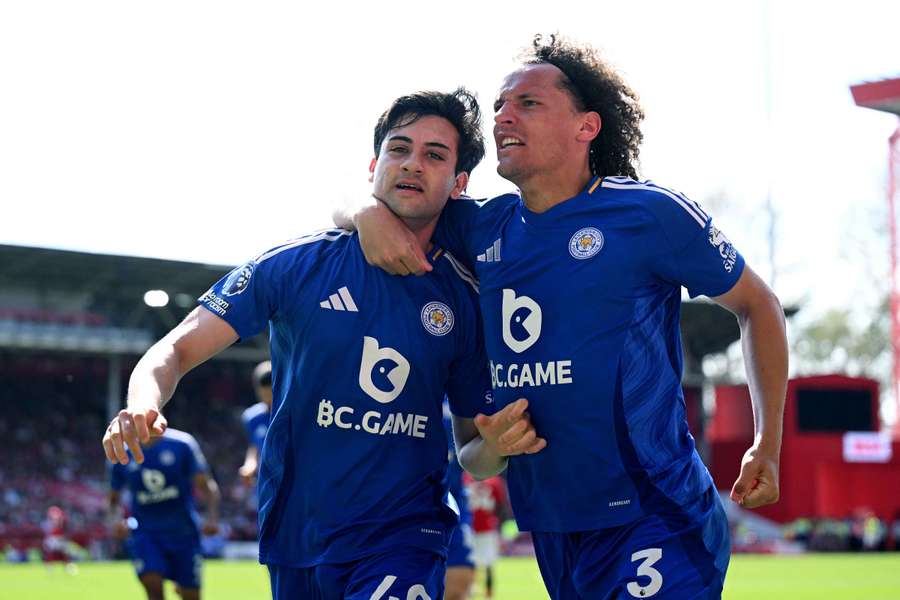 Facundo Buonanotte celebrates scoring Leicester's second goal with teammate Wout Faes