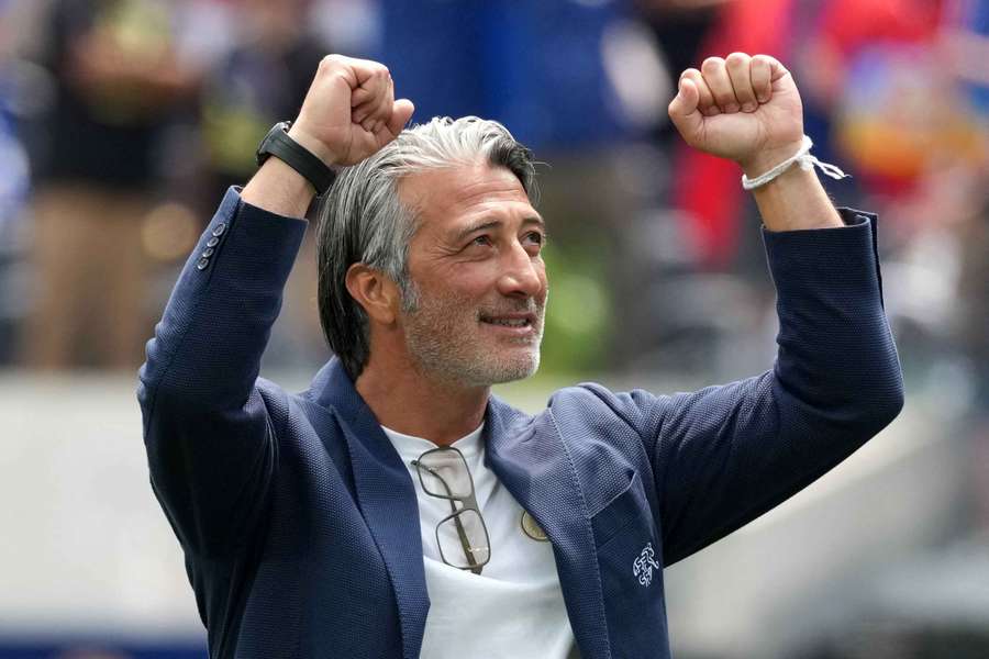 Murat Yakin celebrates after Switzerland's victory