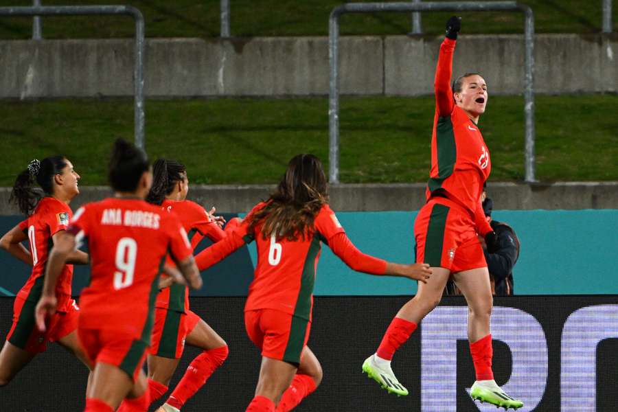 Portugal's Telma Encarnacao (R) celebrates with her teammates