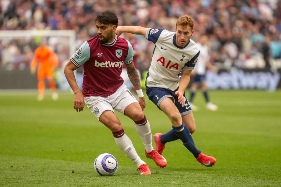 West Ham's Lucas Paqueta is pressured by Tottenham's Dejan Kulusevski