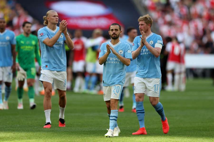 Manchester City's Erling Haaland (L), Bernardo Silva (C) and Kevin De Bruyne (R) have all been nominated