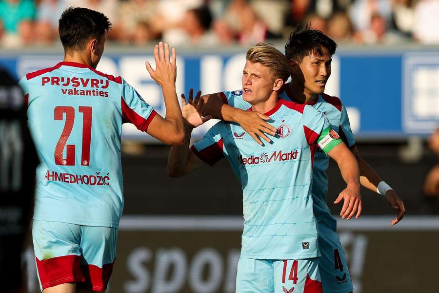 Feyenoord's Sem Steijn (#14) celebrates scoring the 2-1 against Excelsior