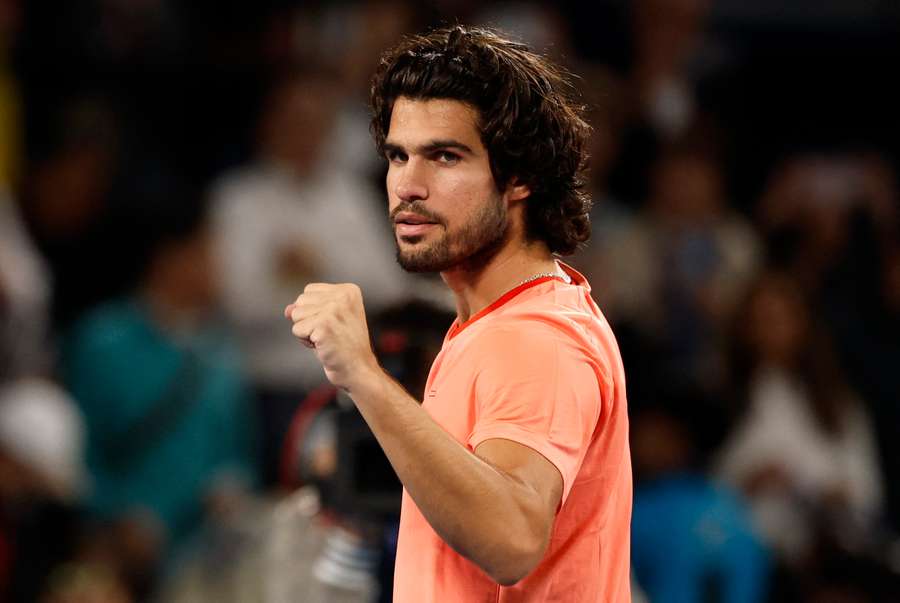 Carlos Alcaraz celebrates after winning his semifinal match against Jaume Munar
