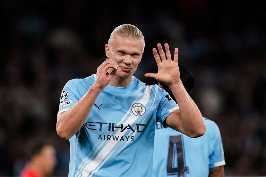 Erling Haaland celebrates after scoring the opening goal for Man City against Napoli