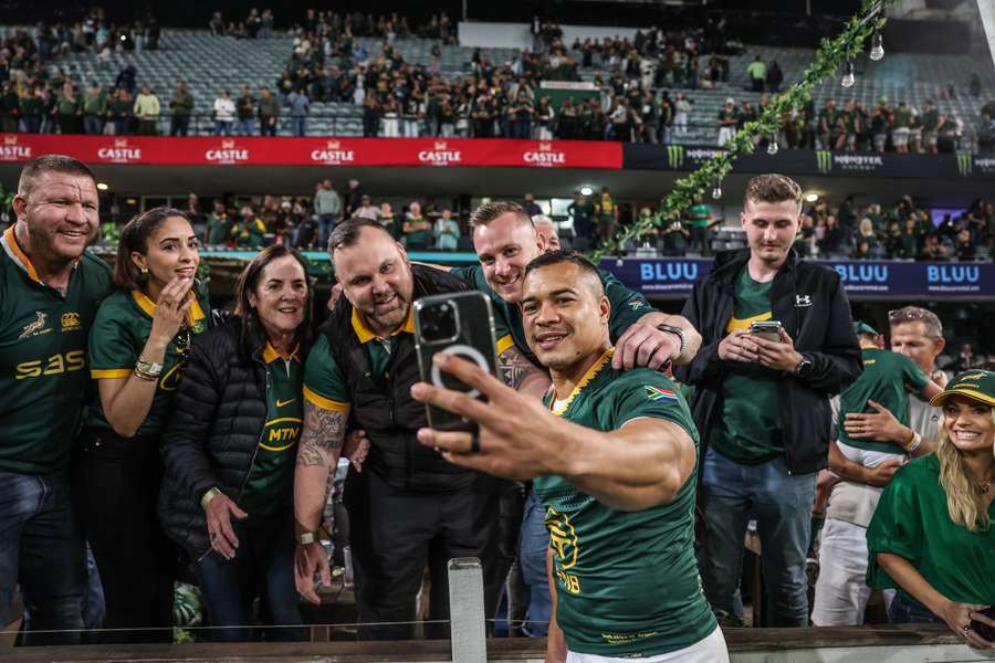 Springboks wing Cheslin Kolbe takes a selfie with fans at Kings Park Stadium.