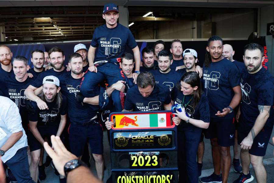 Verstappen celebrating with his team