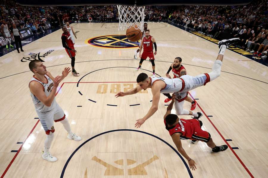 Michael Porter Jr. #1 of the Denver Nuggets drives to the basket against Kyle Lowry #7 of the Miami Heat during the first quarter