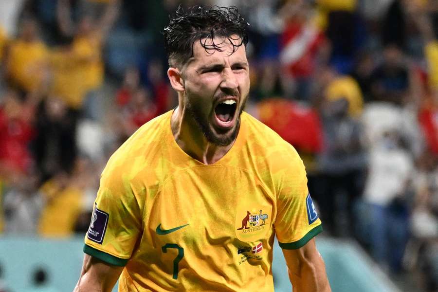 Australia's Mathew Leckie celebrates after giving the Socceroos a 1-0 lead over Denmark.