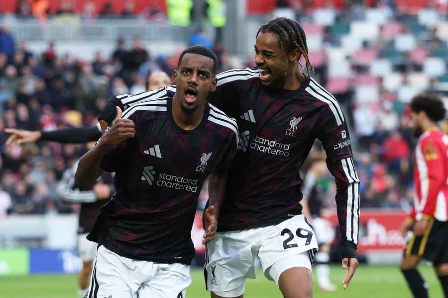 Liverpool's Alexander Isak celebrates scoring their second goal with Bradley Barcola