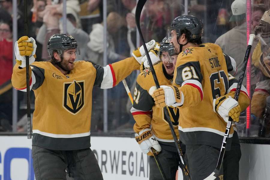 Golden Knights players celebrate goal in Game 1 against Ducks