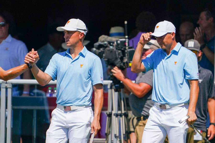 Team USA golfers Justin Thomas and Jordan Spieth walk to the first tee during the foursomes