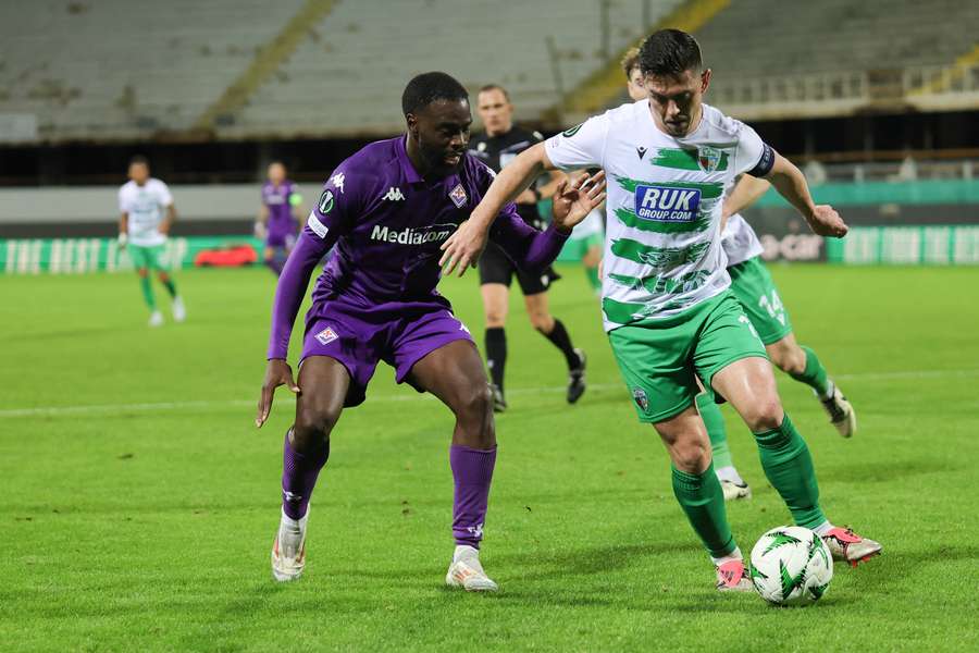 Daniel Redmond of The New Saints controls the ball