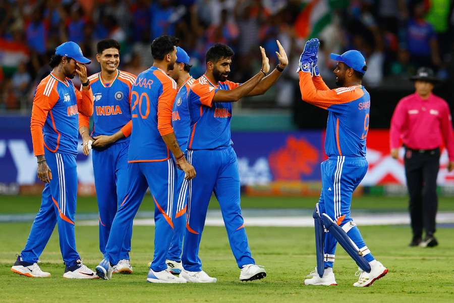 India players celebrate taking wicket of Mohammad Haris