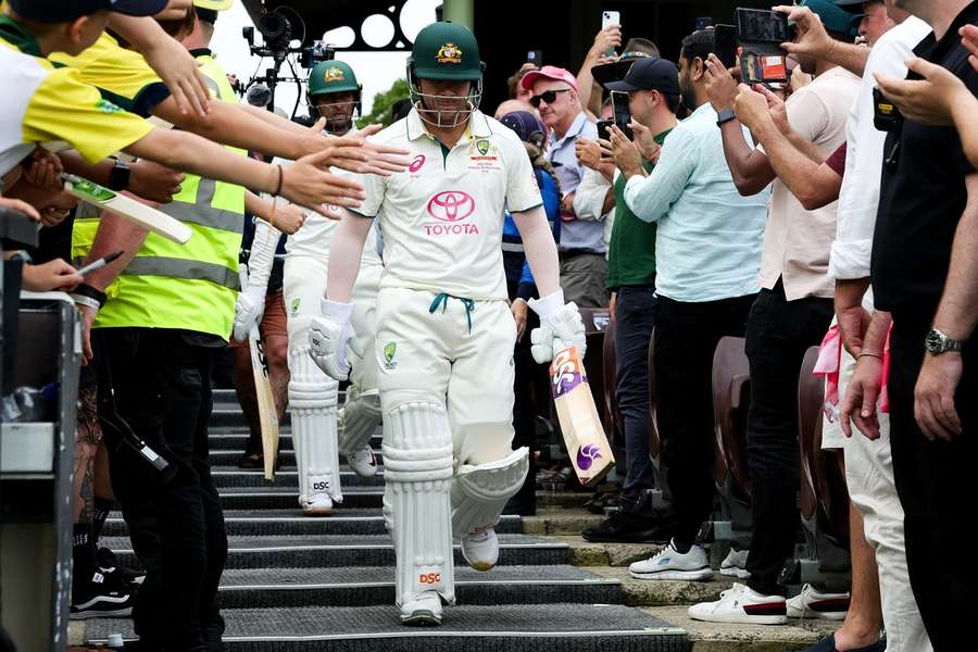 Warner received a standing ovation when he came out to bat