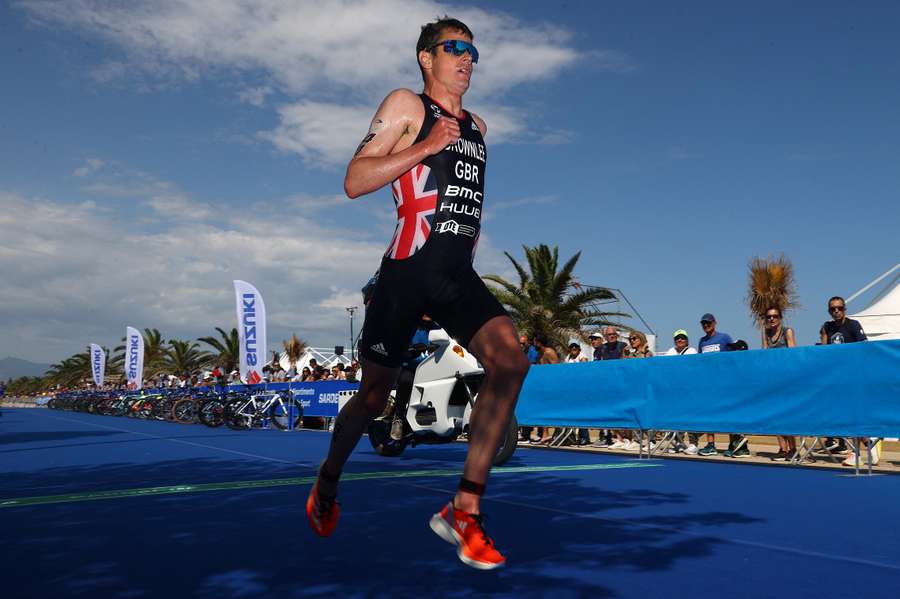 Jonny Brownlee in action at the World Triathlon Series Cagliari in 2023
