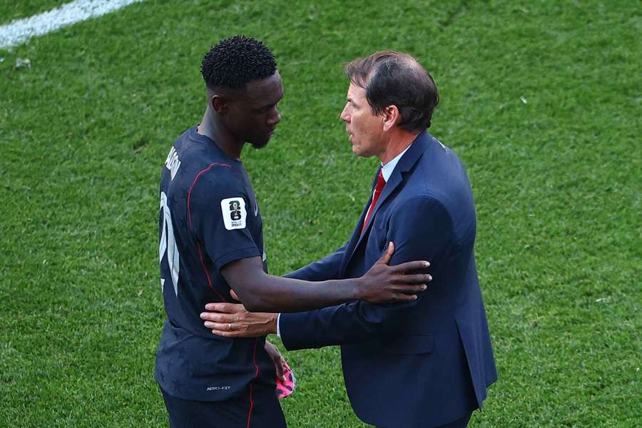 Folarin Balogun and Rudi Garcia exchange words following the game Folarin Balogun and Rudi Garcia exchange words following the game