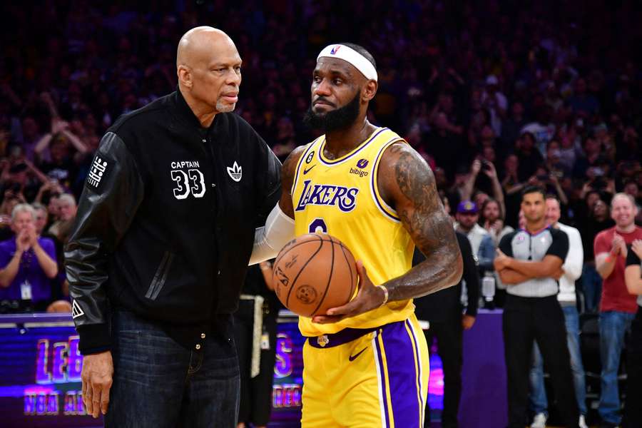 Los Angeles Lakers forward LeBron James meets with former player Kareem Abdul-Jabbar after breaking the NBA all time scoring record