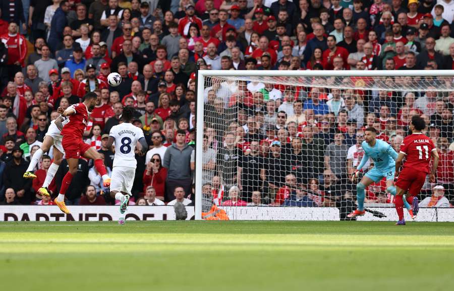 Liverpool's Dutch striker #18 Cody Gakpo (2L) scores the team's third goal