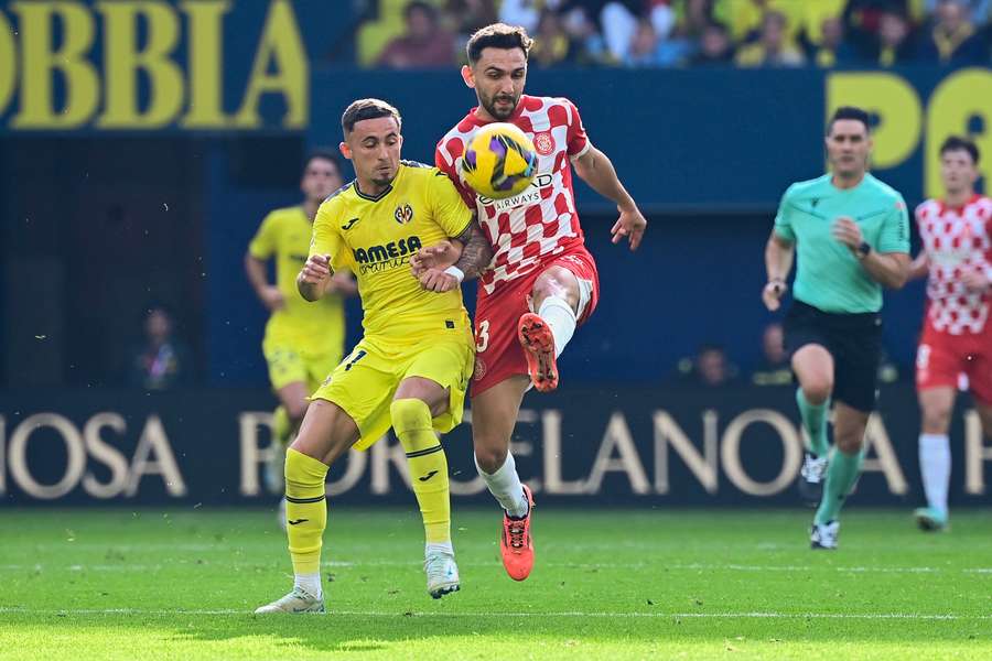 Yeremi Pino, left, challenges Girona's Ivan Martin