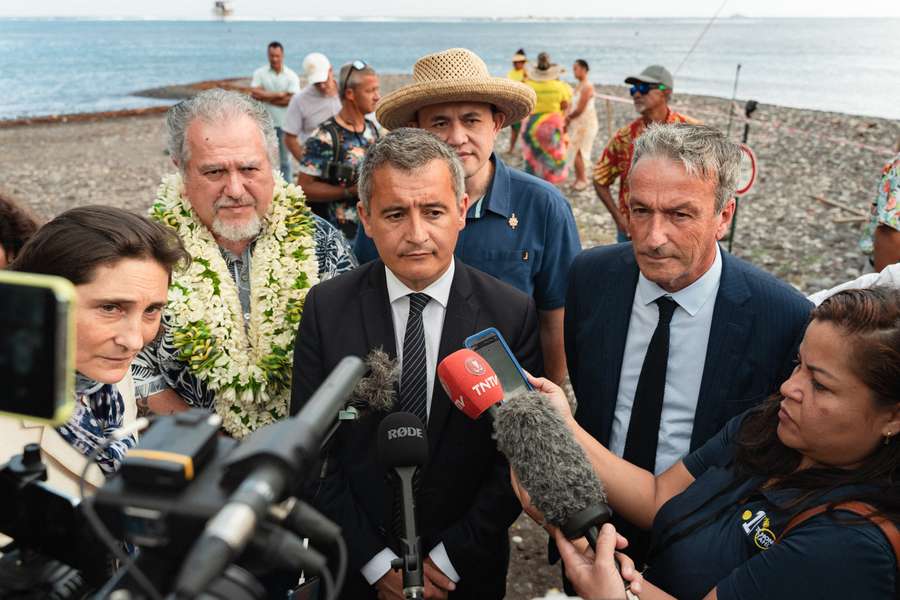 Gerald Darmanin, Minister of the Interior and Overseas Territories, speaks during a tense press sequence at the site of the 2024 Olympic surfing event