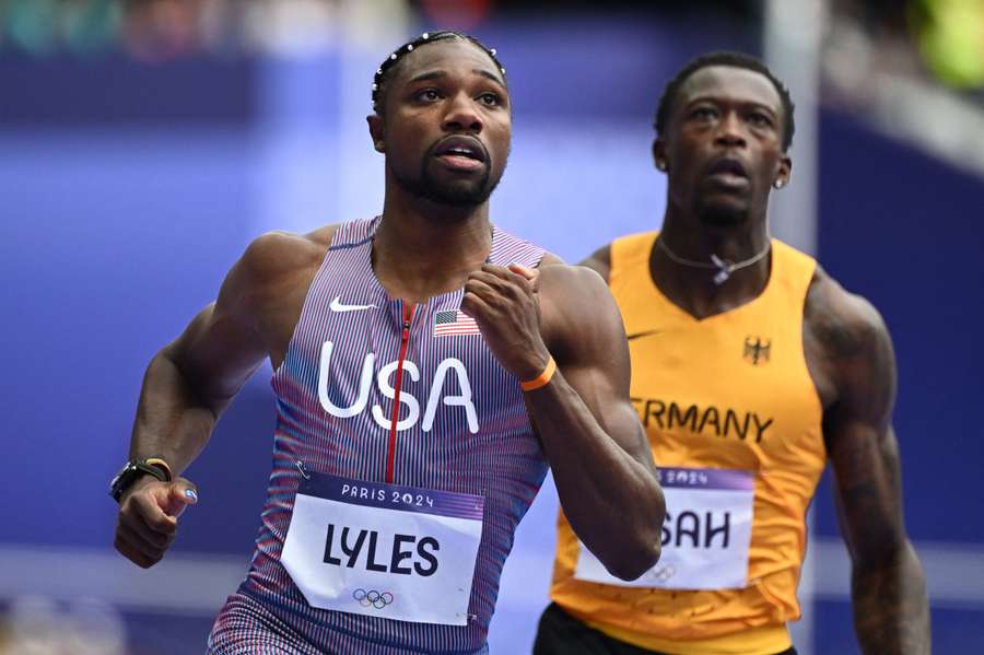 US' Noah Lyles competes in the men's 100m heat