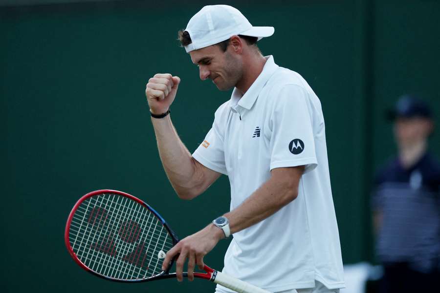 Tommy Paul celebrates a point in his fourth round match