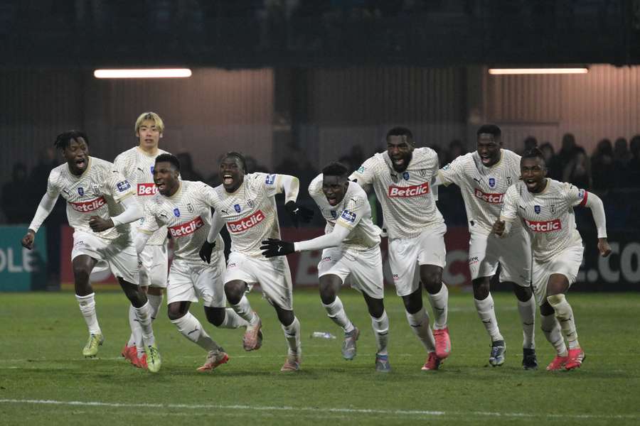 Les Rémois célébrant leur qualification.