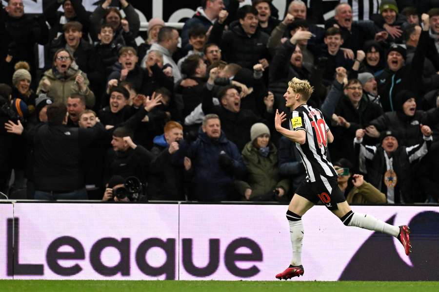 Newcastle United's English midfielder #10 Anthony Gordon celebrates after scoring their second goal