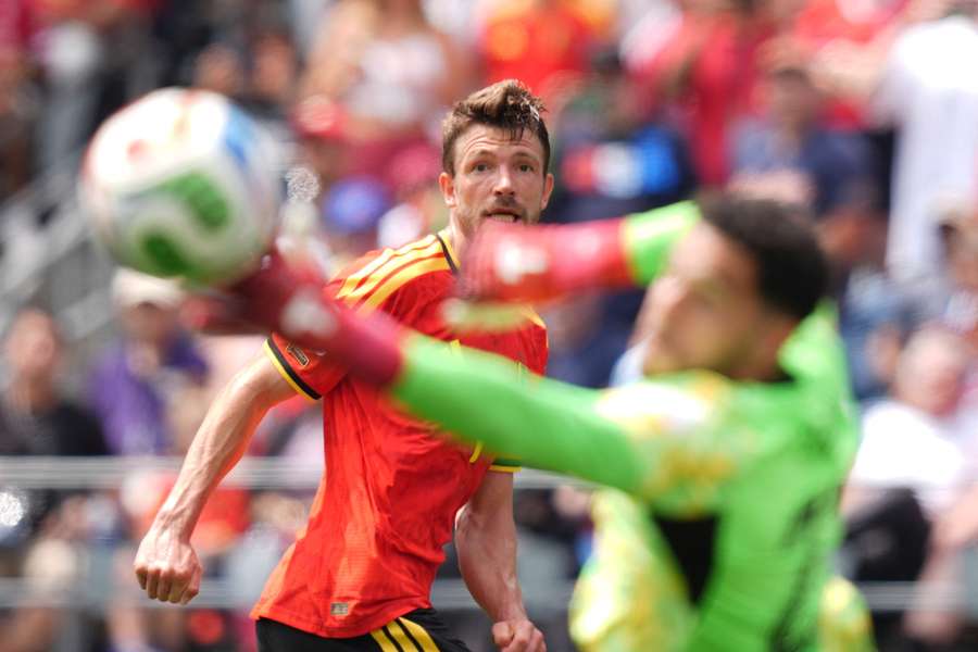 Belgium's Brandon Mechele watches as Mostafa Shobeir saves his header