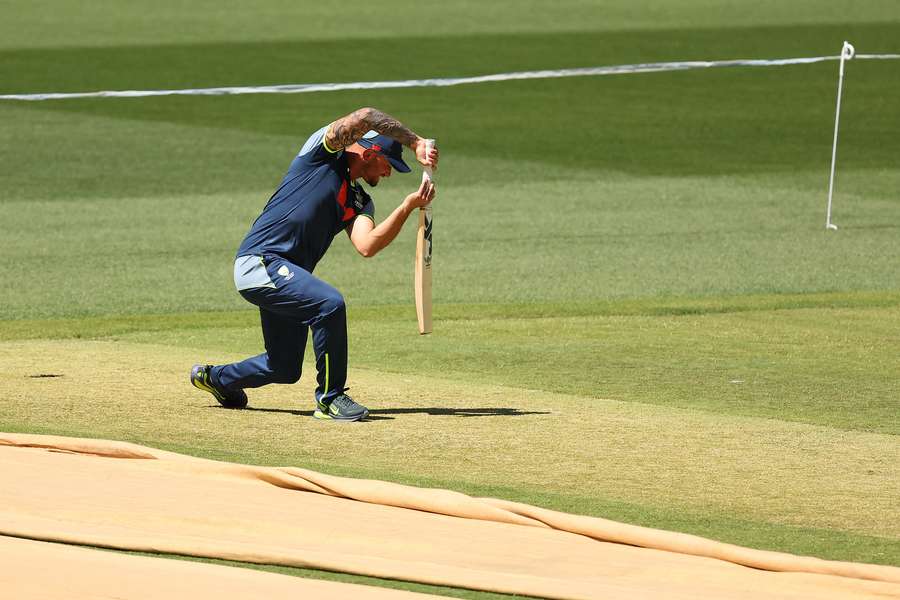 Jake Weatherald shadow bats on the centre wicket of Optus Stadium after being informed of his selection.