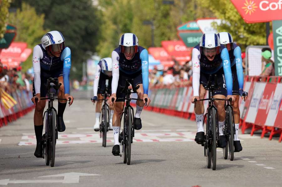 Israel-Premier Tech riders cross the line during the Vuelta