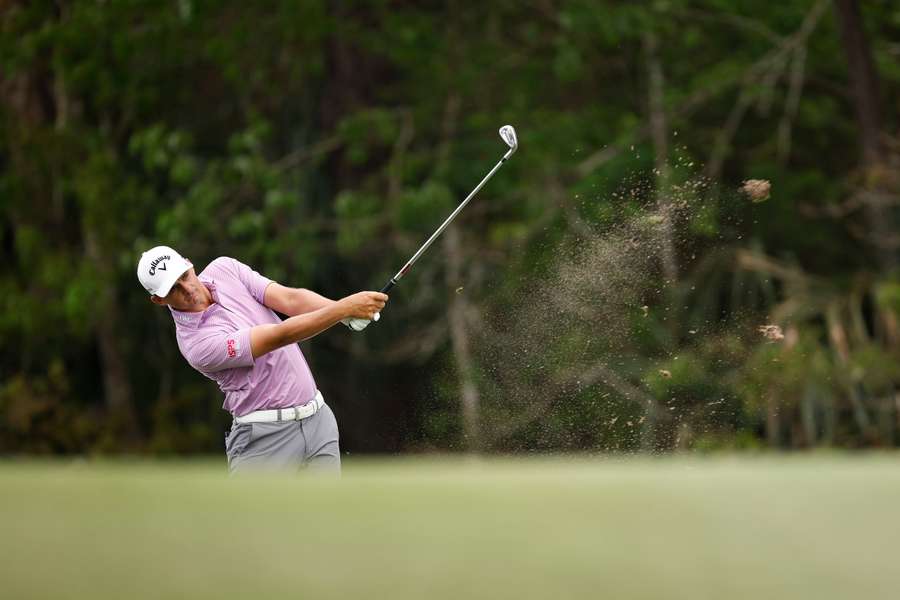 Christiaan Bezuidenhout of South Africa plays an approach shot on the 14th hole 