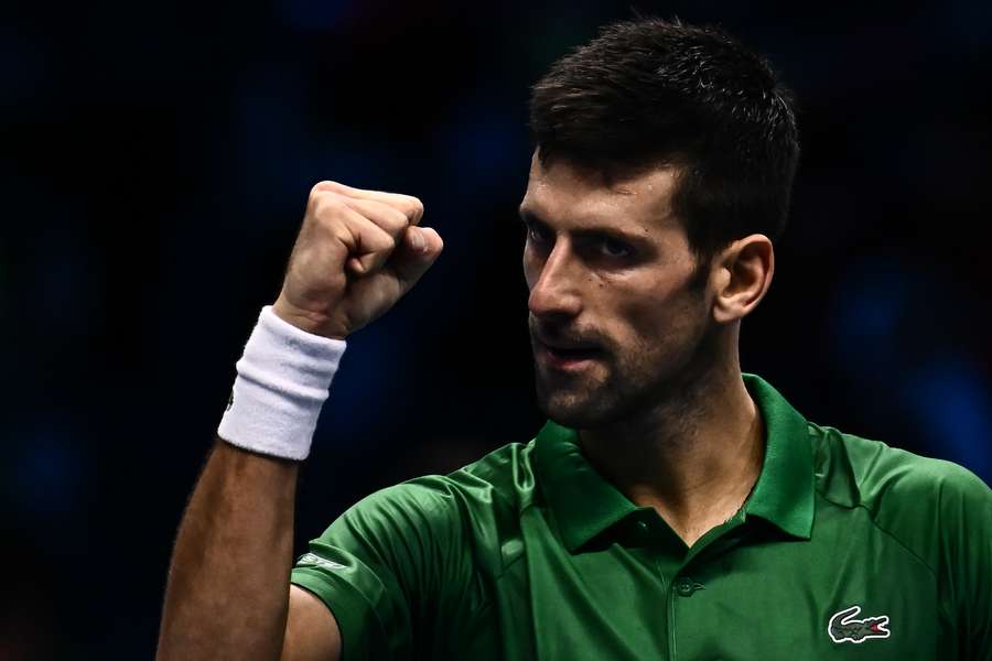 Serbia's Novak Djokovic celebrates after winning his round-robin match against Russia's Daniil Medvedev