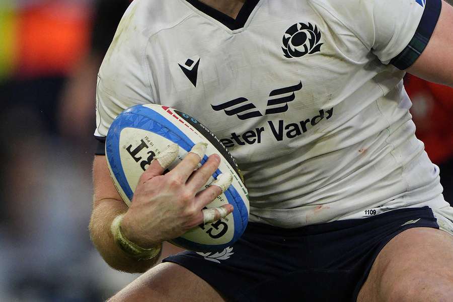 A Scottish rugby player in action