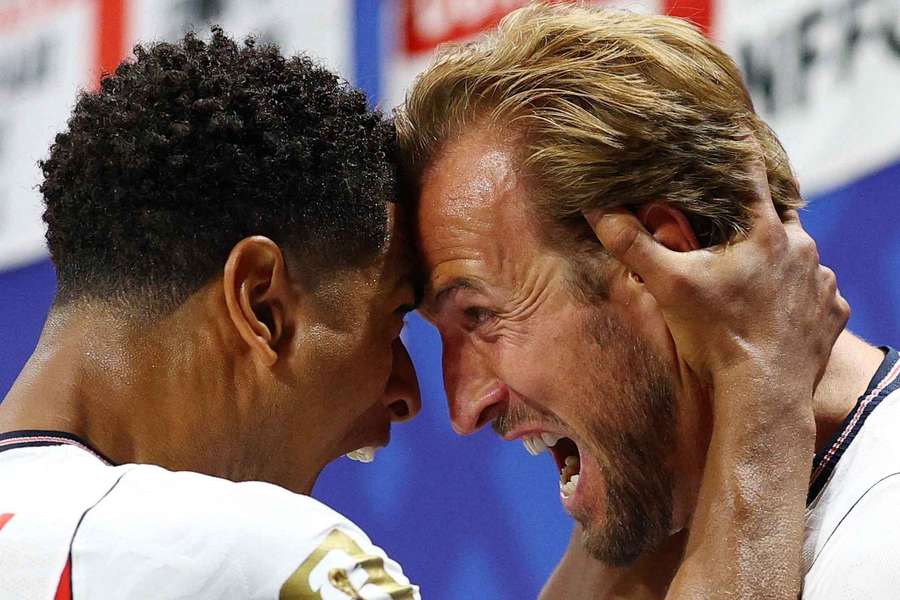 England's Harry Kane celebrates scoring their first goal with Jude Bellingham England's Harry Kane celebrates scoring their first goal with Jude Bellingham