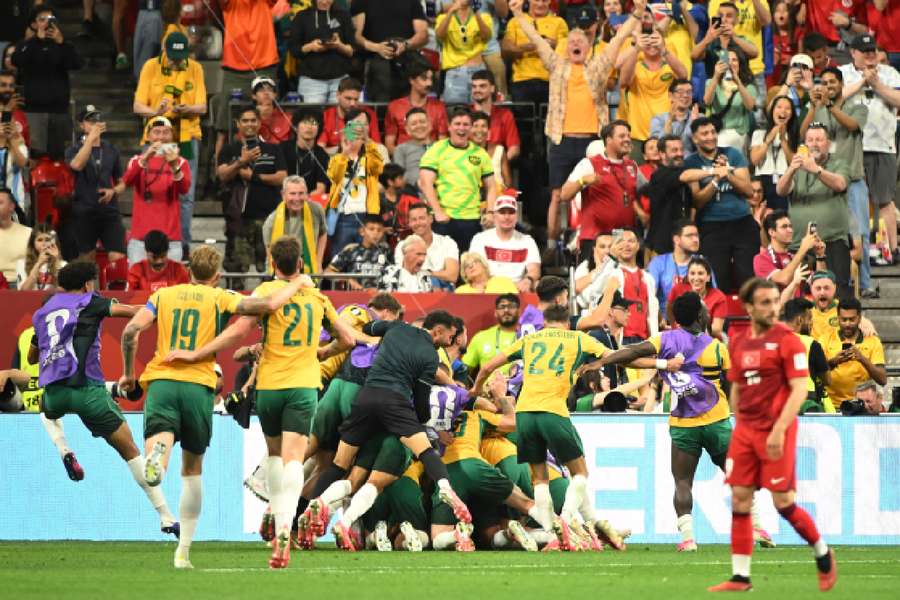 Australia celebrate socring second goal Australia celebrate socring second goal