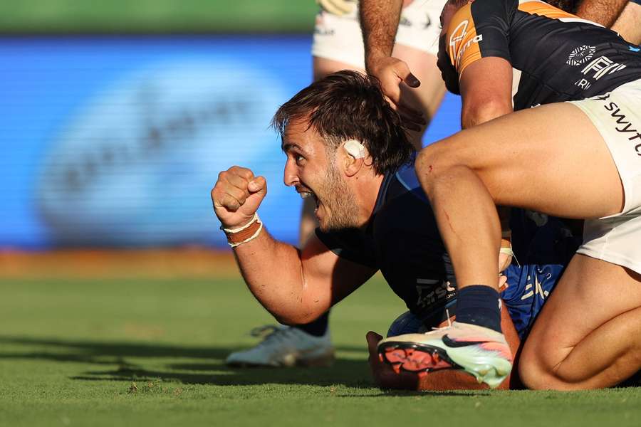 Western Force import Franco Molina celebrates a try. 