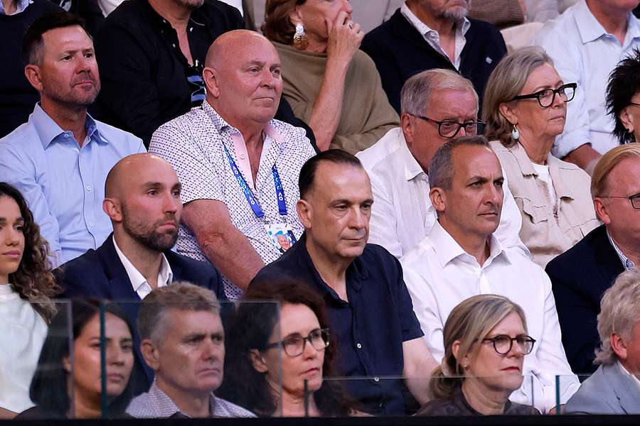 Abdo (second row, right) seen at the Australian Open men's final alongside Peter V'Landys. Abdo (second row, right) seen at the Australian Open men's final alongside Peter V'Landys.