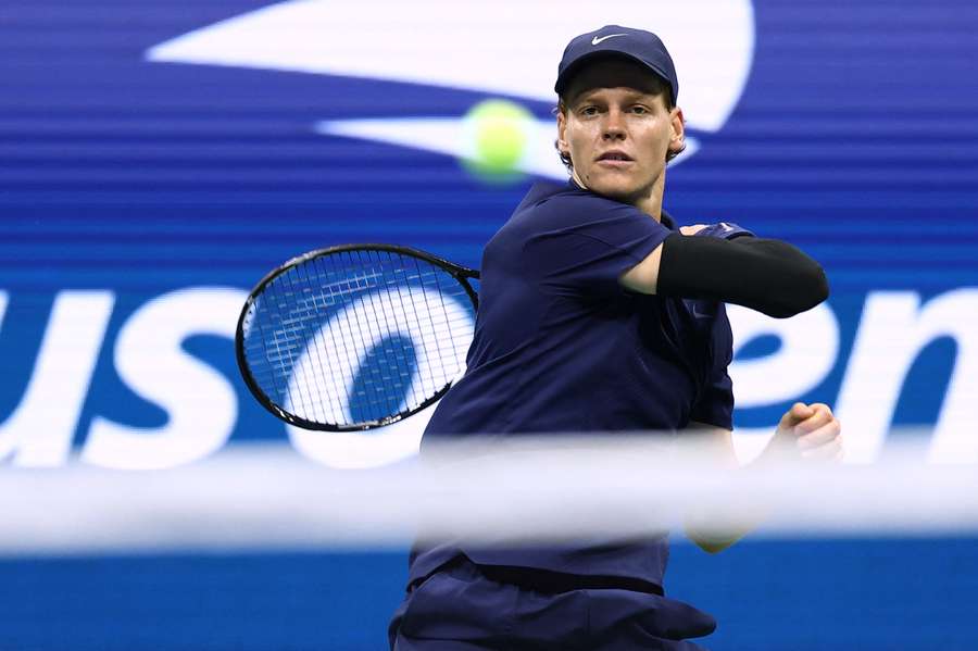 Jannik Sinner hits a forehand